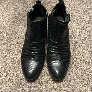 Women’s black ankle boot.
